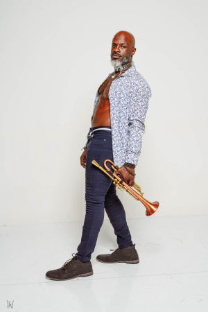 Follow The Naked Trumpeter on InMelanin